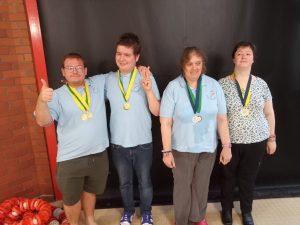 Members of Stevenage Dolphins Swimming club show off their medals.